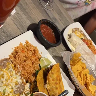 Plates of food, drinks and chips and salsa!