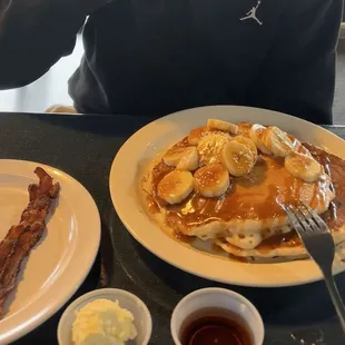 Banana pancakes with (some, he ate it fast!) side of bacon.