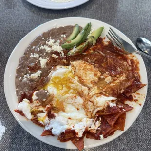Chilaquiles in red sauce (after I'd already started digging in).