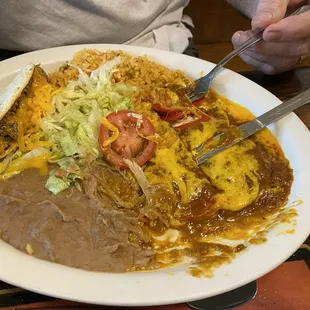 Beef Taco with 2 Cheese enchiladas BIG lunch, cut started to eat, so good!