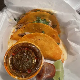 Birria Tacos.  Consume in the oversized cup. Tasty