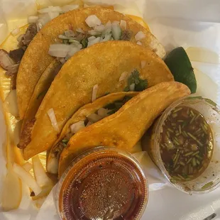 Birria Tacos.  They were great.  That dark red salsa will let you know it&apos;s there to party.  Consume was standard fare.