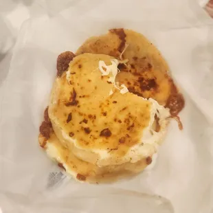 pupusa. Sorry i took a bite before the picture. I could not resist . So good!