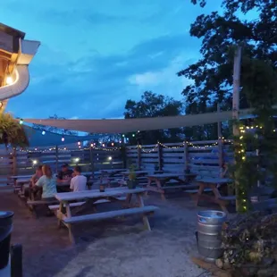 large outdoor patio with fire ring