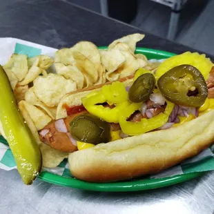 Brat with kettle chips and pickle