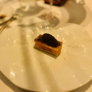 Course 1: toasted egg yolk (excellent)