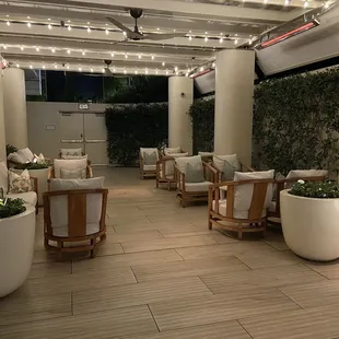 a patio with a lot of furniture