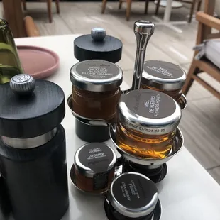 a variety of jars of food on a table
