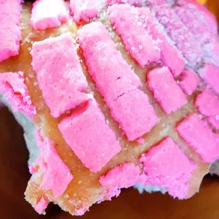 Half eaten pink concha... I couldn't wait to take a bite