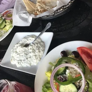 Taziki appetizer and side salad that comes with the entree, amazing dressing