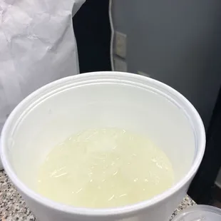 a plastic cup filled with liquid