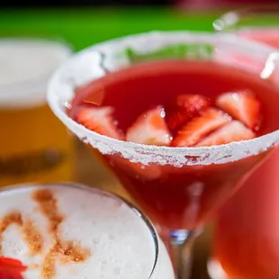 two cocktails with strawberries