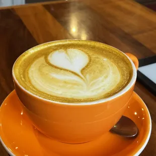 a cup of coffee on a saucer