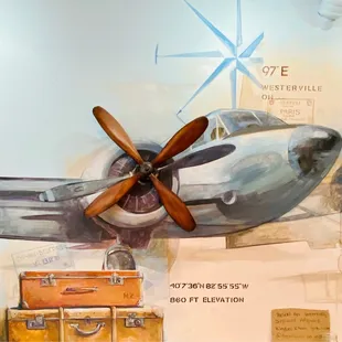 an airplane with propellers and suitcases