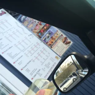 a menu in a rear view mirror