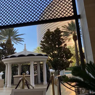 a gazebo in the middle of a courtyard
