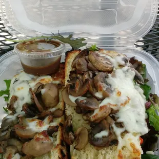 Mushrooms on foccacia. Alas, sandwiches are served in a plastic clamshell box during lockdown.