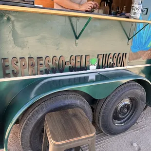 a man standing at a food truck