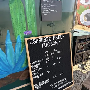 a sign for the espresso self