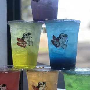 a variety of colored drinks