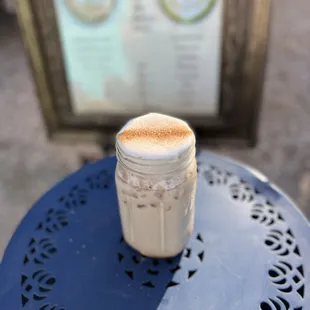 a cup of coffee on a table
