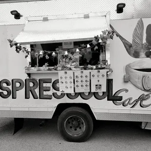 a coffee truck parked on the side of the road