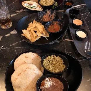 Gorditas with shrimp, chicken Tinga tacos, Elote's corn and an awesome array of different salsas/sauces...