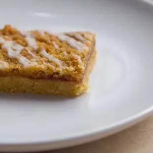 A rich cherry almond desert bar.