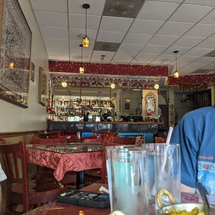 a man sitting at a table in a restaurant