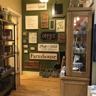 green walls and wood floors