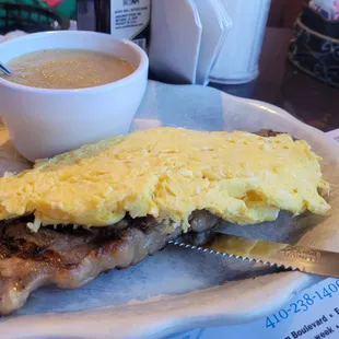 Steak and eggs with applesauce