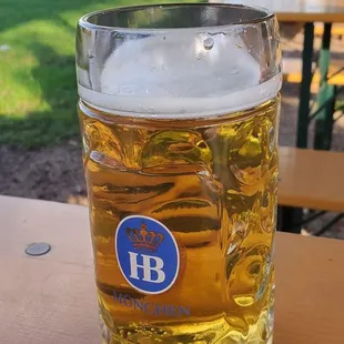 a glass of beer on a table