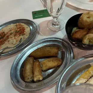 Sides for the table - potatoes, bananas, rolls, polenta