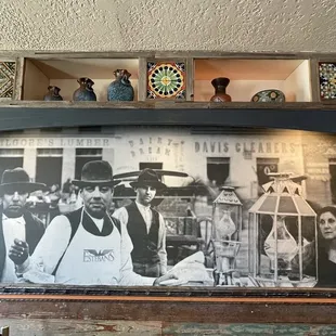 a group of people in a kitchen