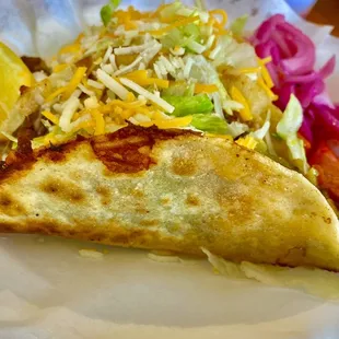 a close up of a taco