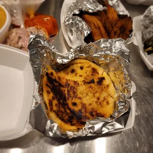 Pork and cheese pupusas - after first bite, immediately regretted not ordering more.