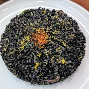 Fried Arroz Negro, Squid and Romesco