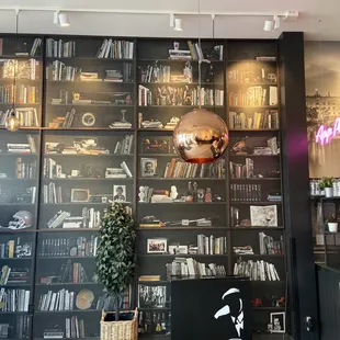 a large bookcase with books on it
