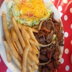 Steak Milanesa with fries/salad.  You can also get with rice/beans. $10.75, enough to get stuffed