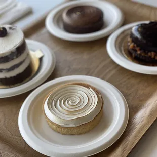 Chocolate and lemon tarts, chocolate praline, and Black Forest cake.