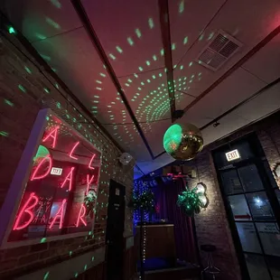 a neon sign in a bar