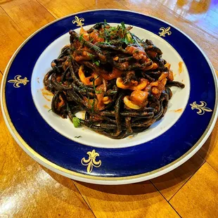 Amatriciana - fresh squid ink bucatini w/tomato, garlic, chili, squid, and house-cured lardon