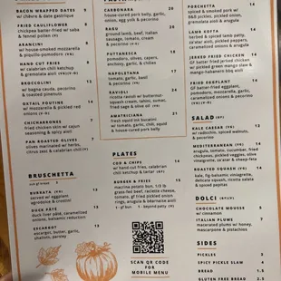 a hand holding a menu