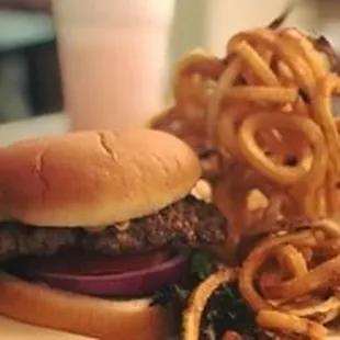 Hand-Pattied Burgers and House-Made Curly Q&apos;s are always on the menu.