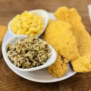 Entree: Fried catfish with sides of dirty rice, Mac and cheese, and cornbread.