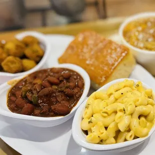 Veggie Combo: Mac N Cheese, Red Beans, fried Okra, and cornbread with Peach Cobbler