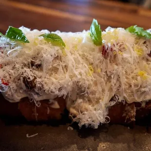 Wagyu carne crudo - grilled focaccia, bafutto aioli, capers, pickled dill