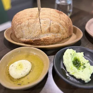 Fresh baked bread with the ricotta and herb spread