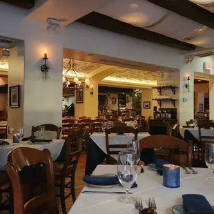 a dining room with tables and chairs