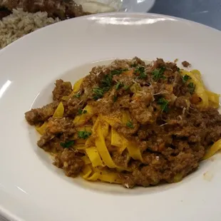 Bolognese Pappardelle pasta, ragout, parmesan cheese, herbs